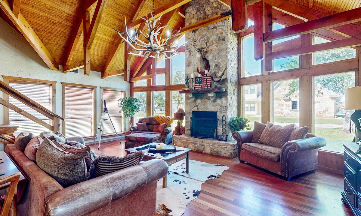 Whitney House | Lake view home with expansive yard, lovely porch & nearby lake access