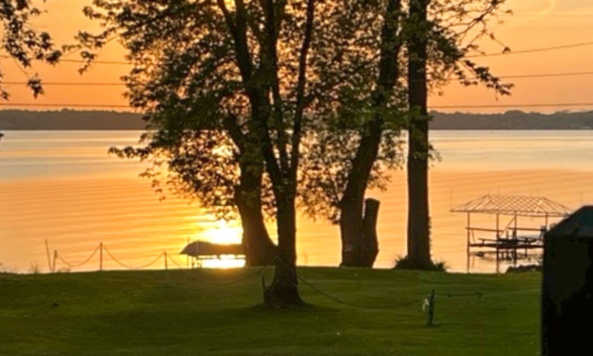 Cayuga House | Lake-view retreat with dock access, firepits, & large yard