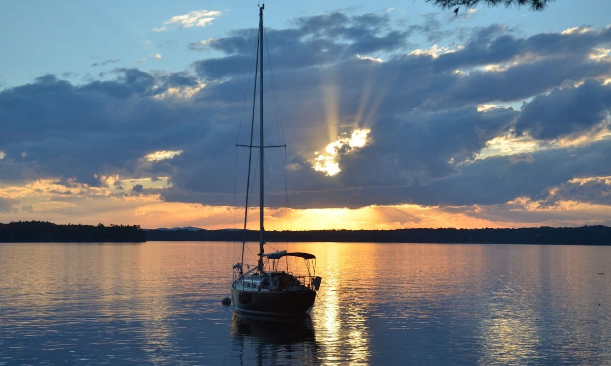 Melvin Village Condo | Lake Winnipesaukee beachfront property.