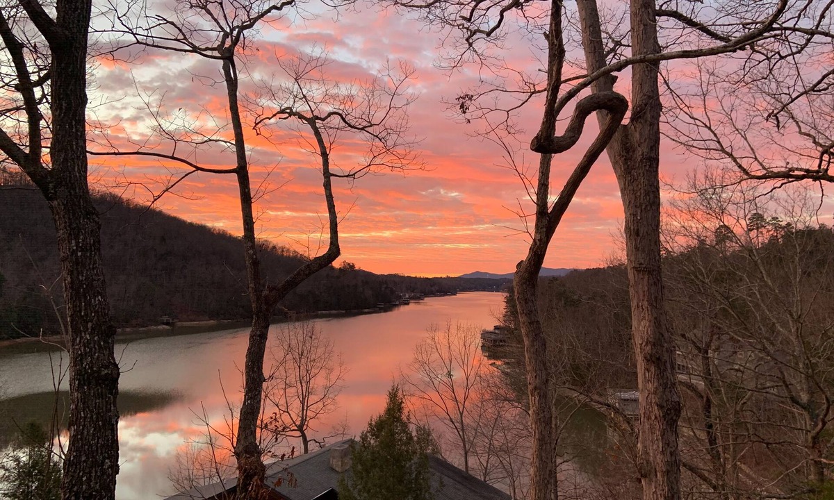 Lake Lure Condo | Lakefront condo with wood-burning fireplace, WiFi, two decks, & great views
