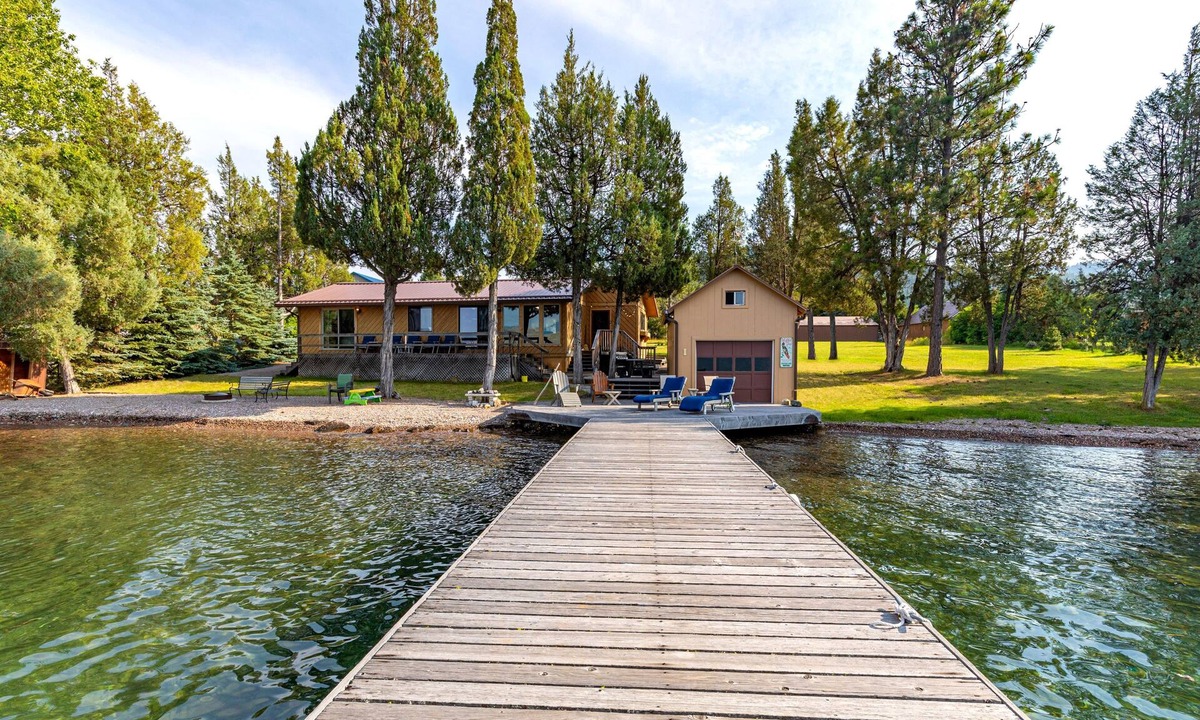 Big Arm House | Lakefront home with private beach, dock, firepit, & grill - dazzling sunset view