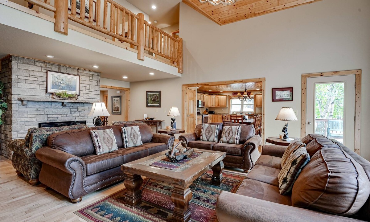 Eagle River House | Lakefront home with private dock, firepit, playground & lake views