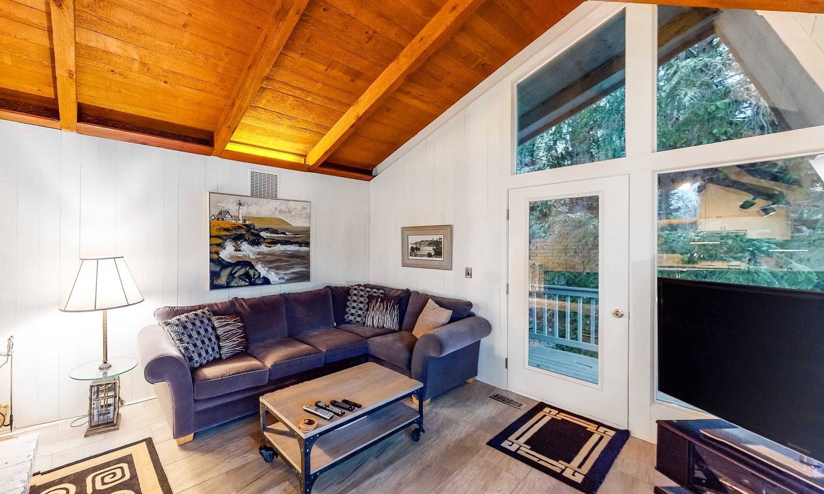 Otis House | Lakefront house with private dock firepit and sunset views