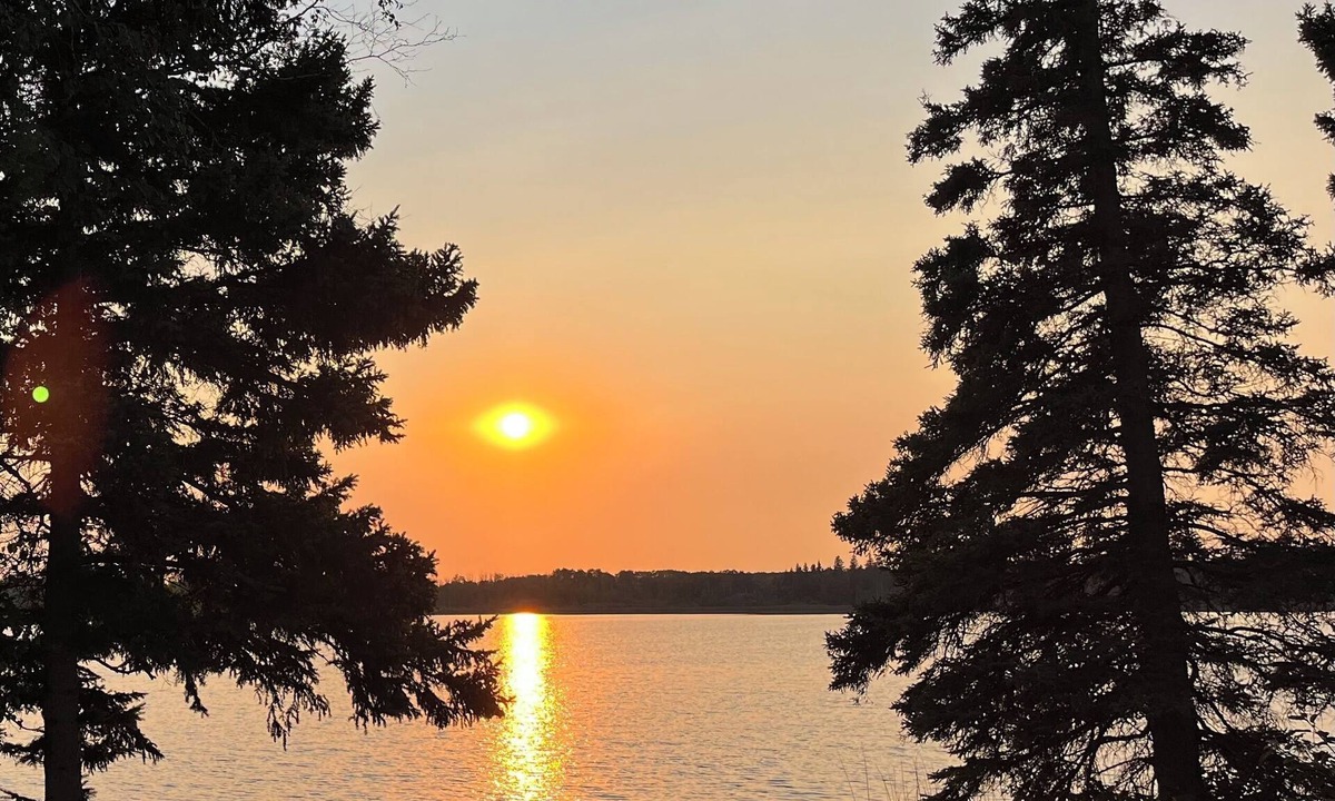 Onanole Cottage | Lakefront Log Cabin with HOT TUB. Unique property with private lake access.