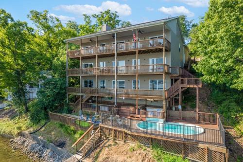 Lake of the Ozarks House | Lakefront Ozarks Home Tiki Bar, Pool, Deck, Views