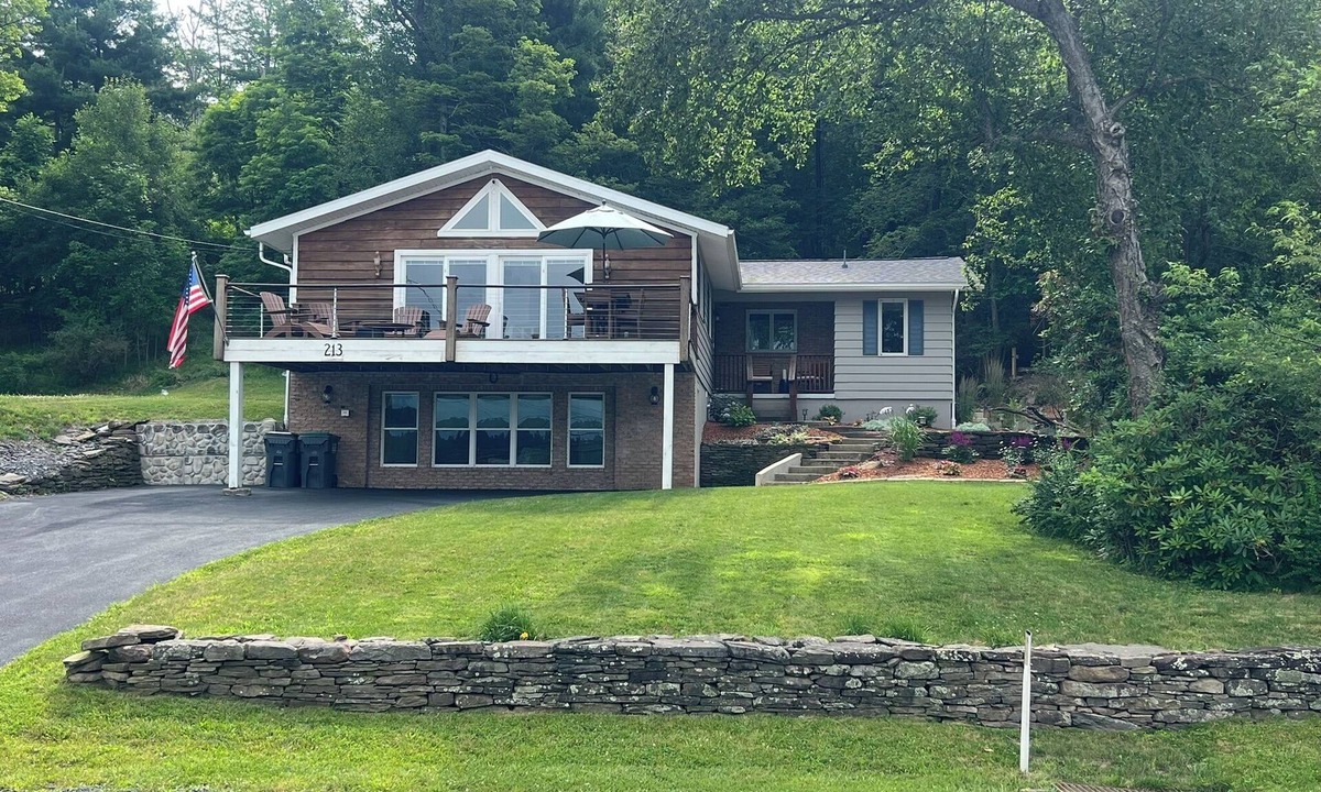 Shawanese House | Lakefront Retreat with Private Dock, Sunset Views, and Gas Firepit