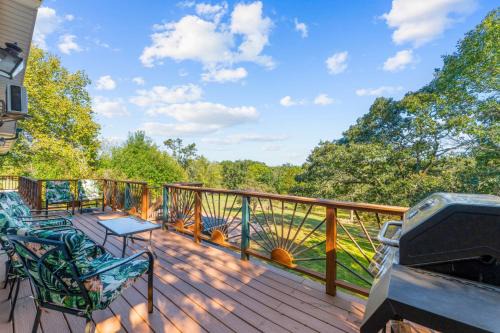 Golden House | Lakefront Retreat with Deck Movie Room and Yard