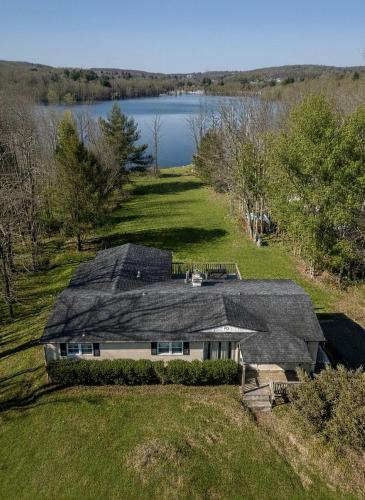 Woodridge House | Lakefront Retreat with Hot Tub, Dock & Firepit Views in Woodridge, New York