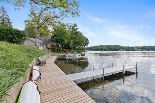 Newaygo House | Lakeside Getaway with Dock, Firepit, Grill