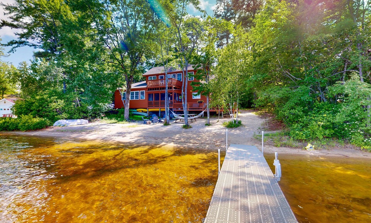 The Bays Cabin | Lakeside home with private dock, firepit, grill, scenic balcony, fireplace & AC