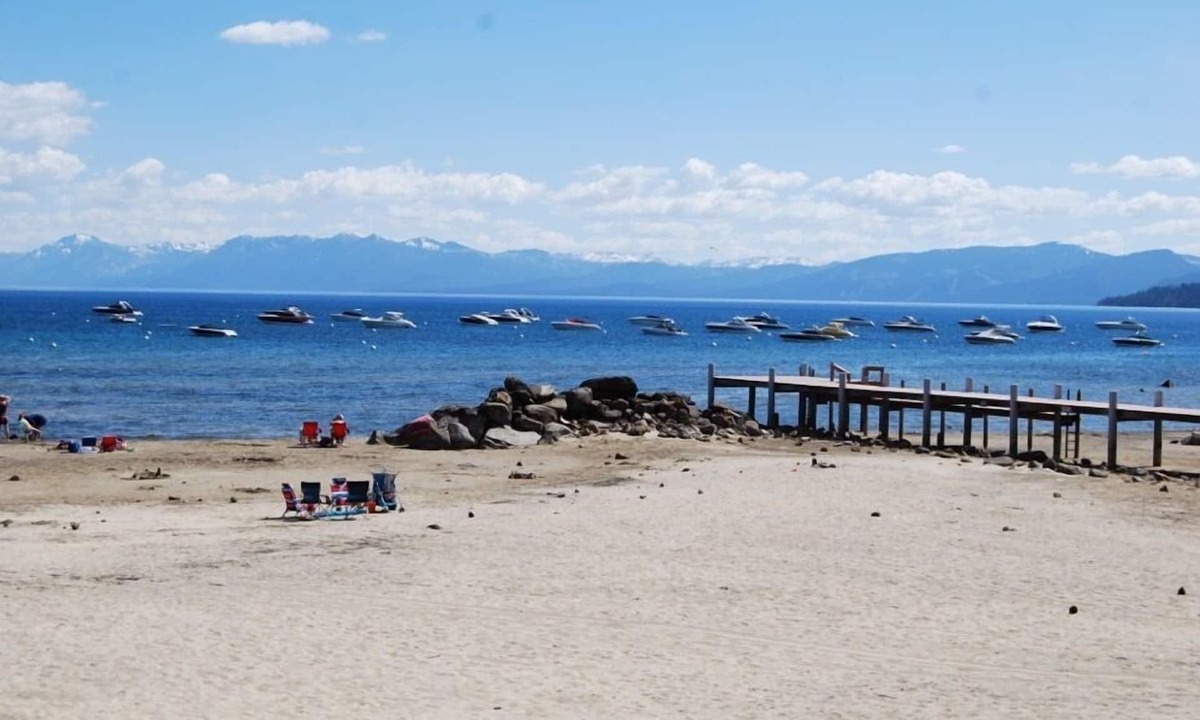 Coffeyville Cottage | Lakeview cottage-steps to beach -shared Lakefront deck! Dog ok