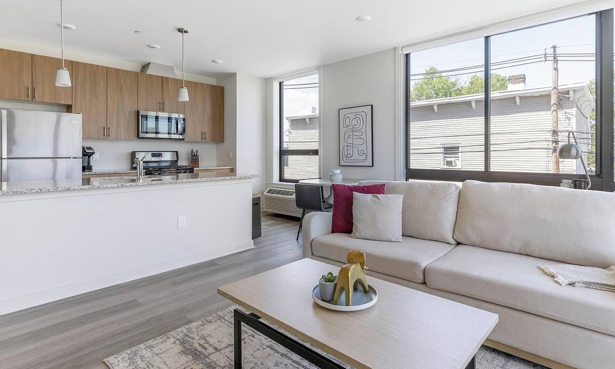 Carteret Apartment | Landing | Modern 2BD, Rooftop Lounge, Gym
