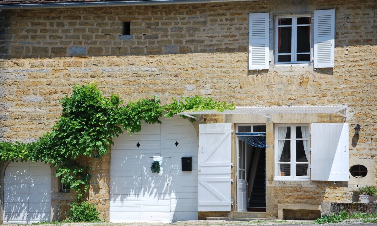 Frontenay House | Landmarked stone house by a stream with extraordinary charm