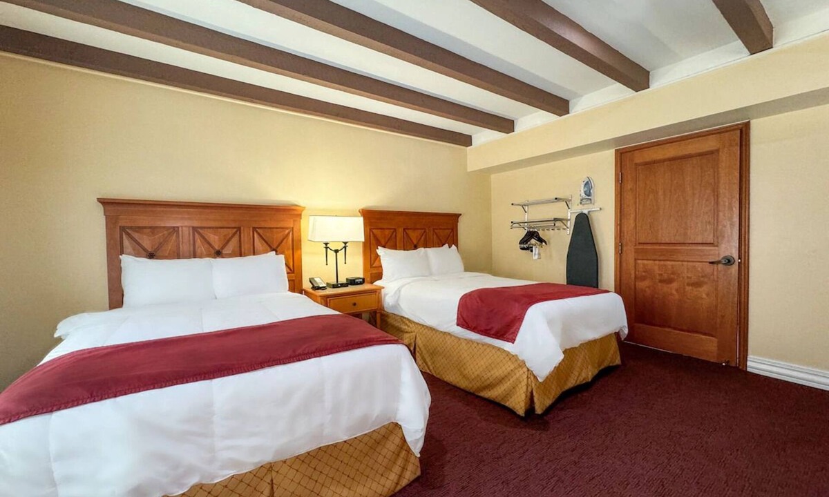 Western Division Hotel | Laredo Stay with Airport Shuttle & EV Charging Station