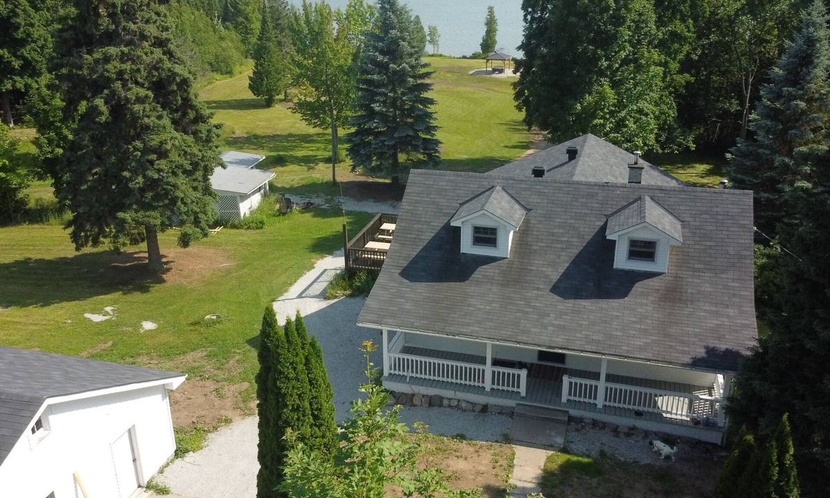 Goulais River Cottage | Large farmhouse style cottage located on three acres of waterfront property.