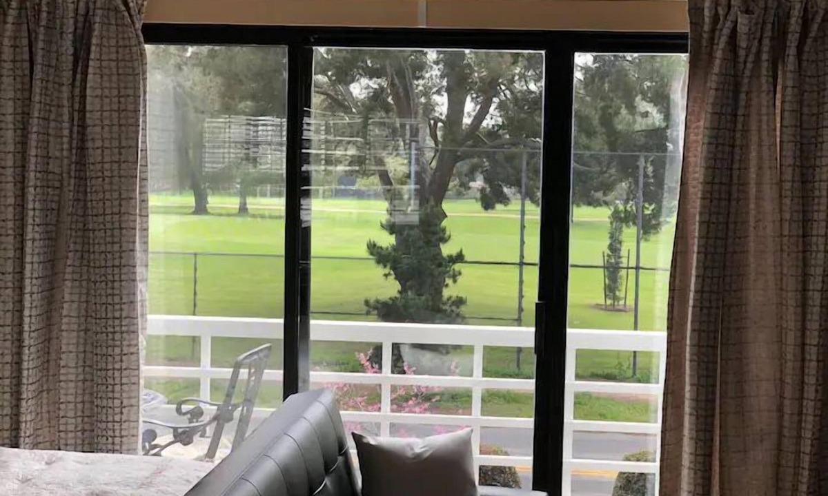 Sunset Park Apartment | Large luxury studio with view in of golf course