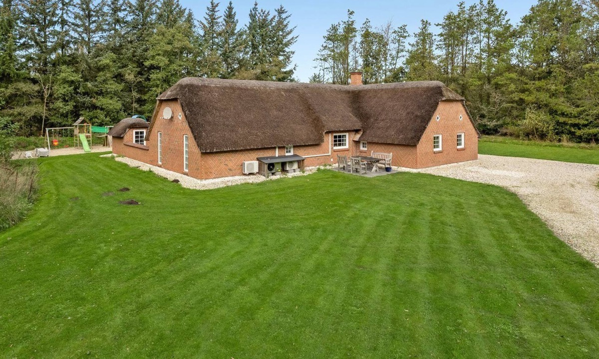 Husby House | Large pool house in quiet Vester Husby with play castle and beach volleyball