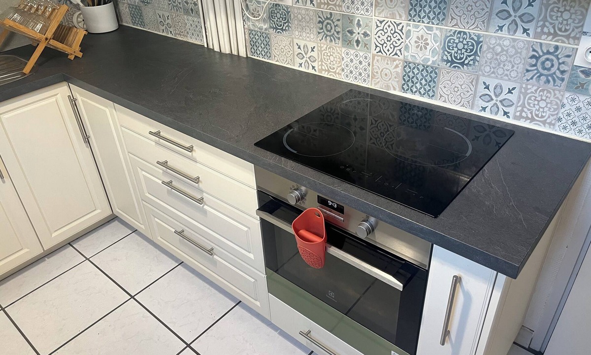 Guilhemery Apartment | Large two-bedroom apartment with three double beds and secure parking.
