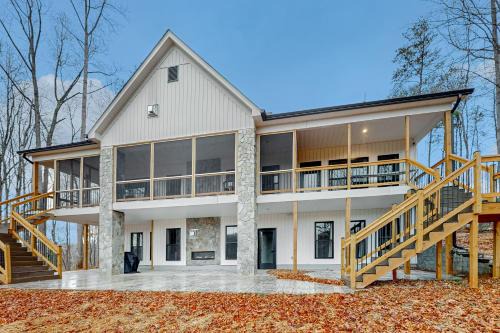 Wirtz House | LaWi Lakehouse - Stunning lakefront oasis with large deck, games, & tranquil views