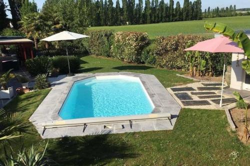 Chambray-les-Tours Ski Chalet | Le chalet sous les arbres