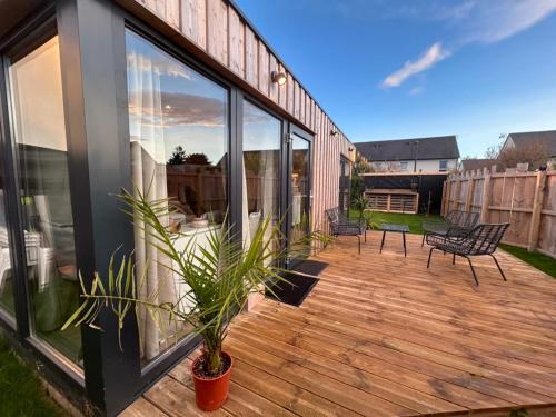 Luc-sur-Mer House | Le coquillage, la clef des paons