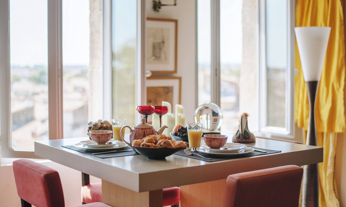 Ecusson Apartment | Le Nid Exotique: views over the rooftops of the city center