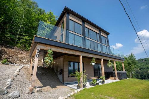 Saint Come Ski Chalet | Le Savannah Vue-Accès Lac-Spa-Terrasse-14 voyageurs- Val St-Côme