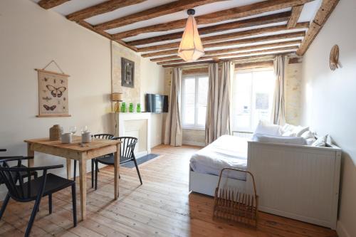 Mortagne-au-Perche Apartment | Les Nids Perchés - Place Notre-Dame