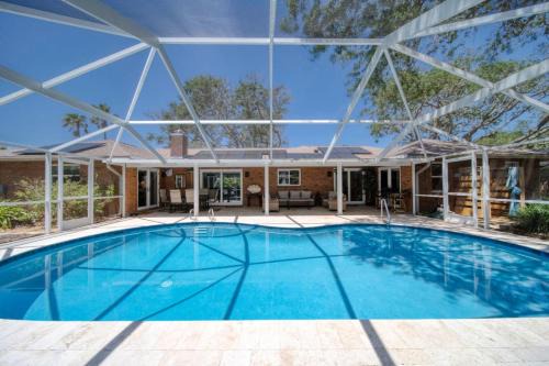 Bay Harbour House | Lighthouse Retreat With A Pool