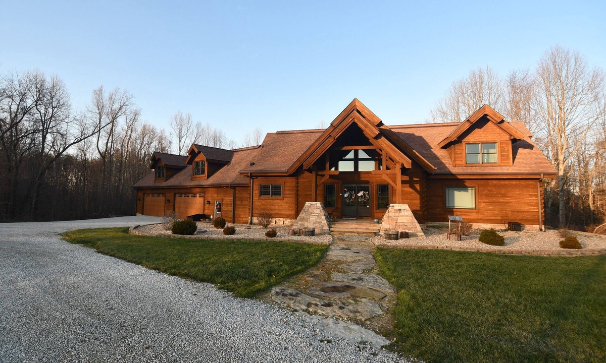 Commiskey House | Log cabin on 108 private acres - cozy inside, adventure outside!
