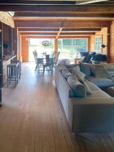 Hojslev House | Log Cabin With Hot Tub And Fjord View