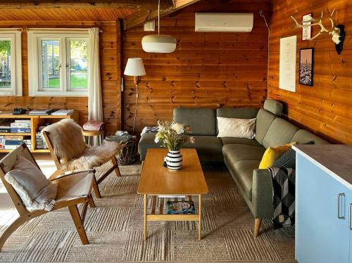 Ørsted House | Log Cabin With Water Views Near Fjellerup Beach