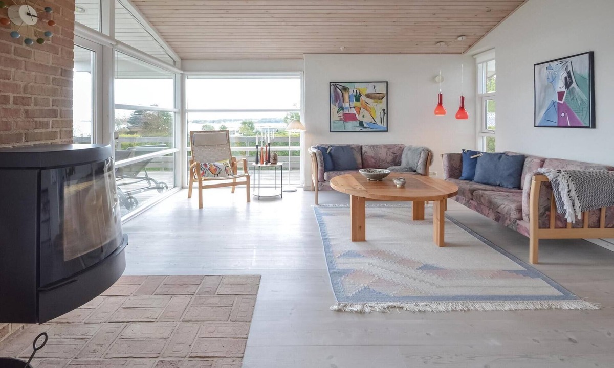 Ronbjerg House | Look forward to a relaxing vacation in this cozy cottage with fantastic views of the fjord.