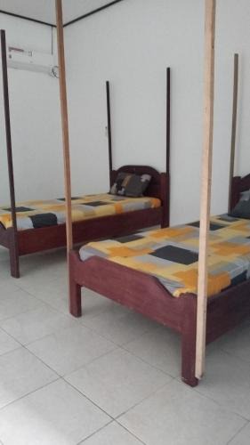 Katiet House | Losmen katiet beach front, lances right surf camp peter Homestay