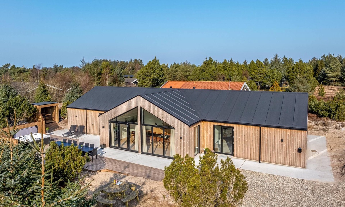 Torup Strand House | Lovely 16-person luxury house with activity room, outdoor hot tub and outdoor.