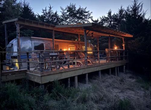 Honey Grove House | Luxurious Remodeled Airstream with Wraparound Deck and Spa near Honey Grove, Texas