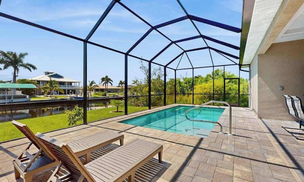 Gulf Cove House | Luxurious waterfront home, pool, Gulf access, and pool table