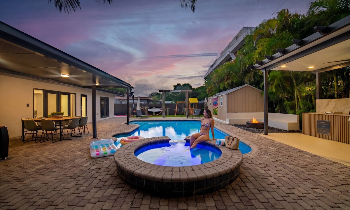 Hialeah House | Luxury 6BR Oasis w/Pool, Fire Pit & Game Area Sleeps 18