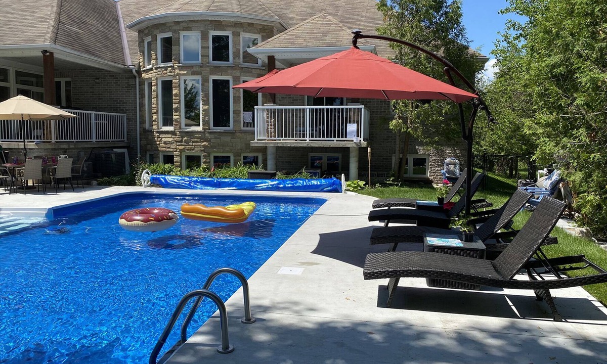 Carden House | Luxury 7000 sq ft Lakefront Home with Hot Tub, Sauna, and Pool