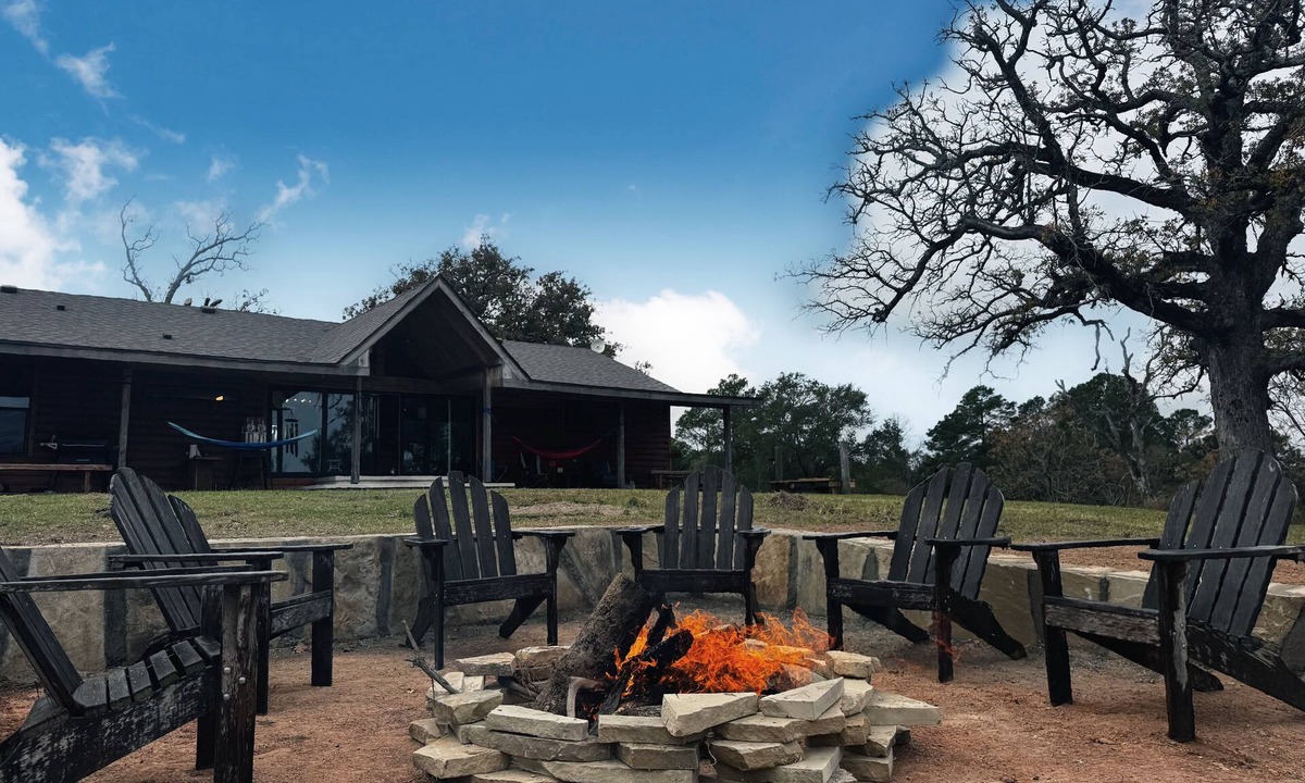 Cotton Gin House | Luxury Cabin on Private Lake - Rustic Elegance - ATV’s, Canoes, Fire Pit, Skeet