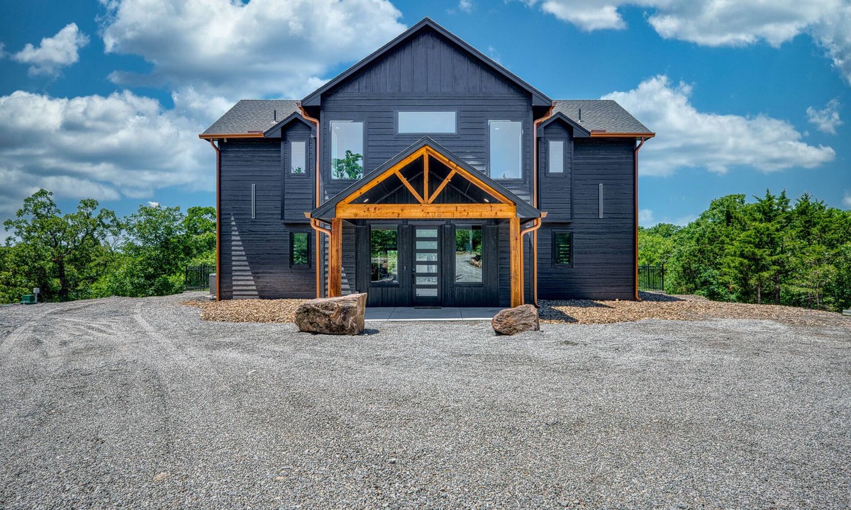 Longtown House | Luxury Lake Retreat: Hot Tub, Inground Trampoline, Putting Green & Sleeps 14