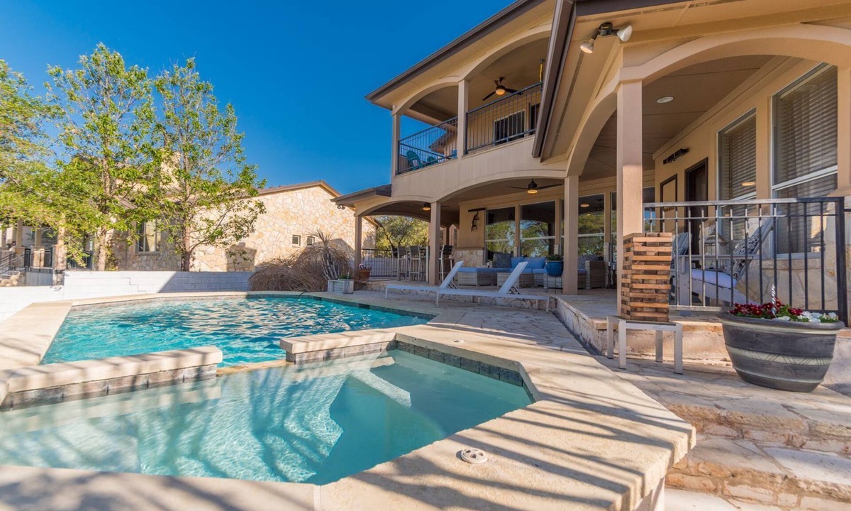Paleface Park House | Luxury Lake Travis Waterfront River Retreat: Heated pool, yard, pool table