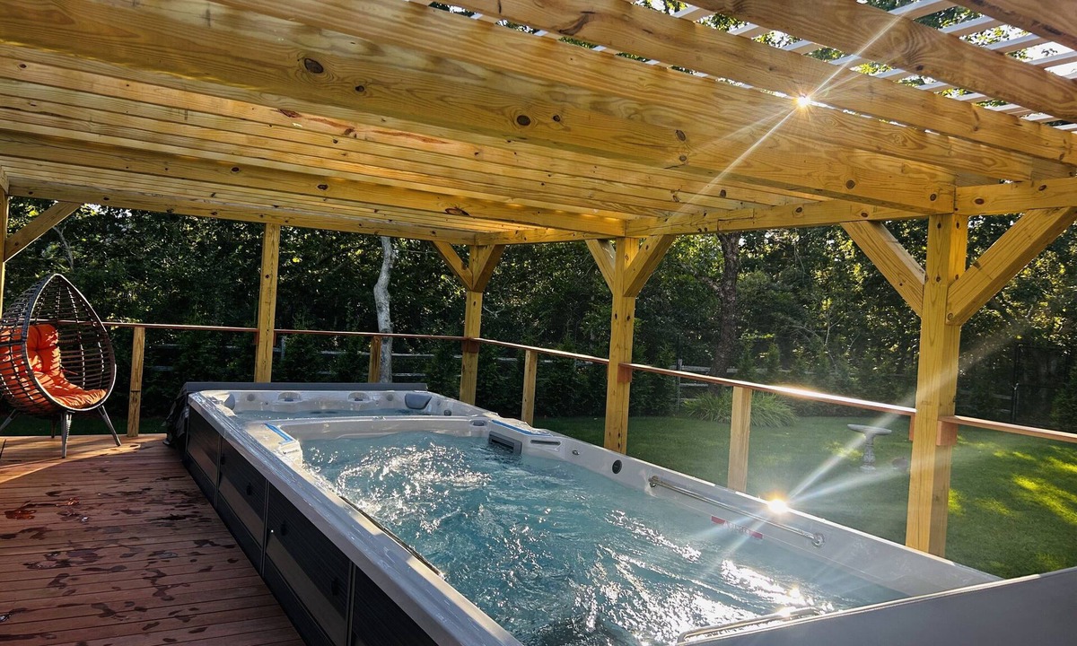 Edgartown Villa | Luxury Log Villa with Endless Pool, Hot Tub & Expansive Grounds