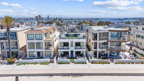 Mission Beach House | Luxury oceanfront fourplex with roof deck sleeps 22