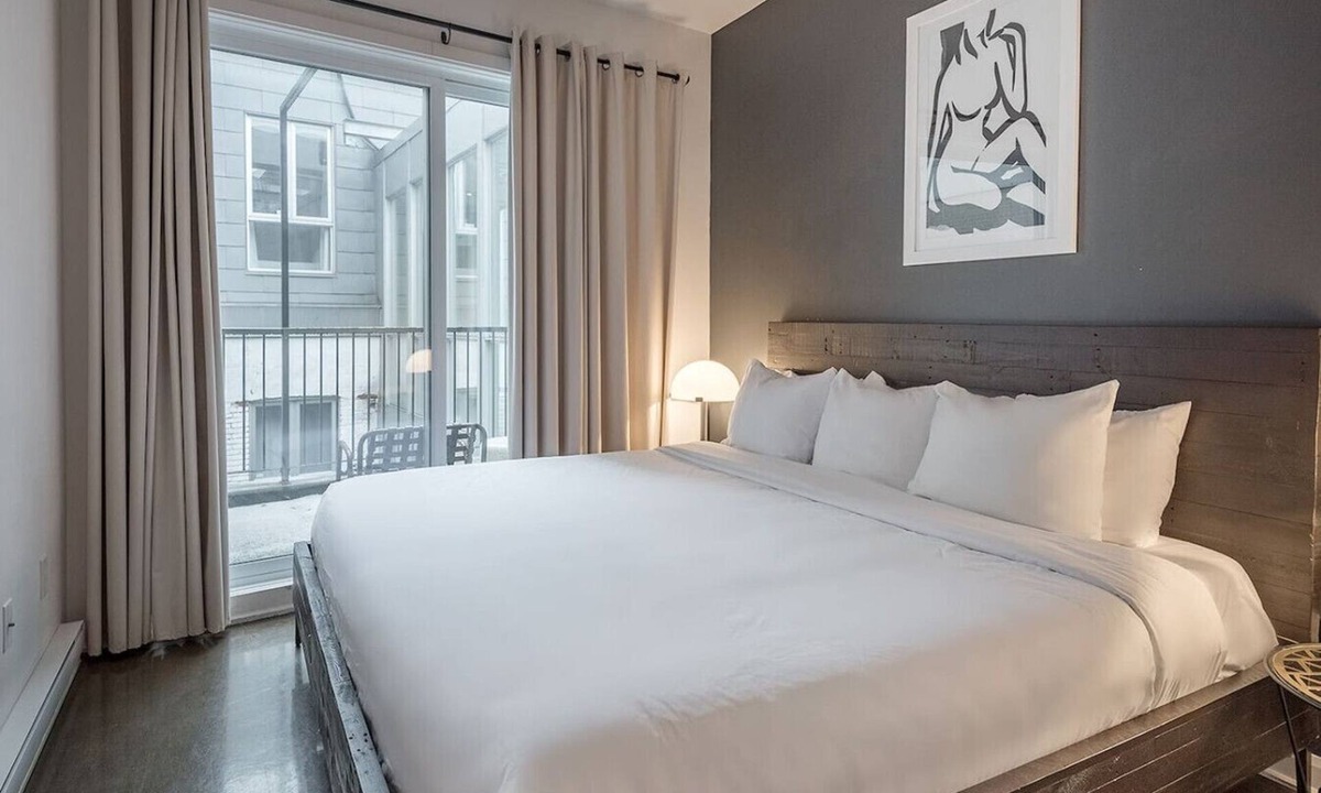 International District Apartment | Luxury Old Montreal Suite with Soaring Ceilings