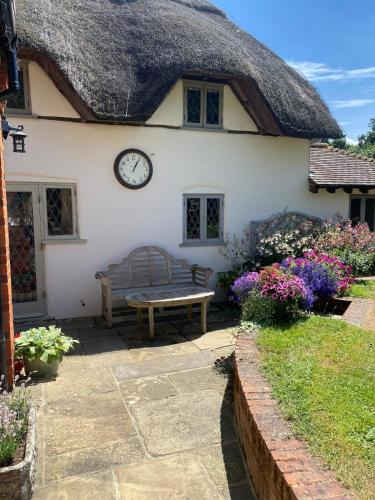 West Heath House | Luxury rural thatched cottage with cedar hot tub