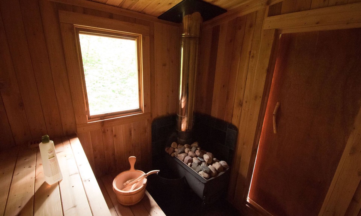 Hovland Cabin | Mökki Hovland Hut - A Unique Glass Wall Timber Frame Nestled in a Maple Forest