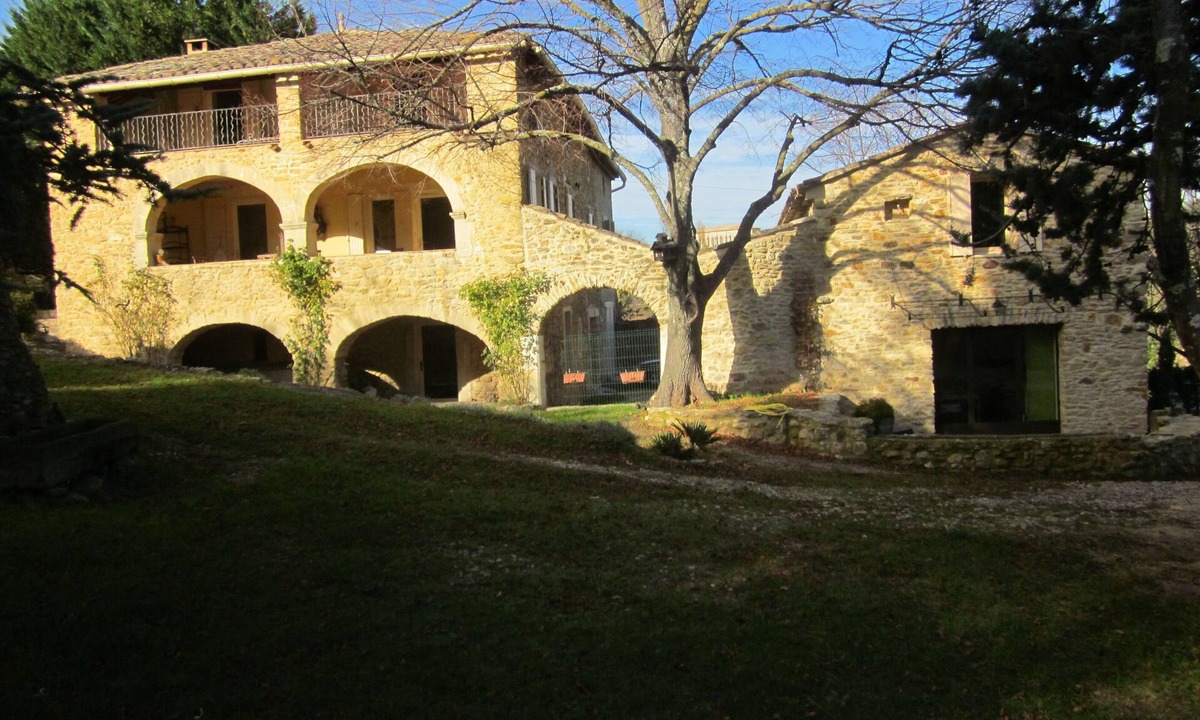 Saint-Marcel-de-Careiret Cottage | Magnificent stone cottage with jacuzzi, swimming pool and large wooded grounds.