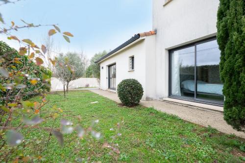 Colomiers Apartment | Maison Épure - maison mitoyenne avec jardin