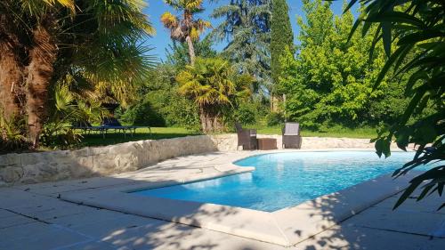 Mezin Villa | Maison de village -8 pers- Piscine chauffée & cuisine d'été en Gascogne